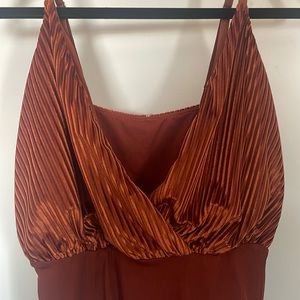 Orange ribbed suede body suit